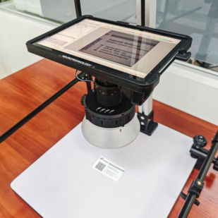 Evidence Collector 300M capturing evidence from a business card